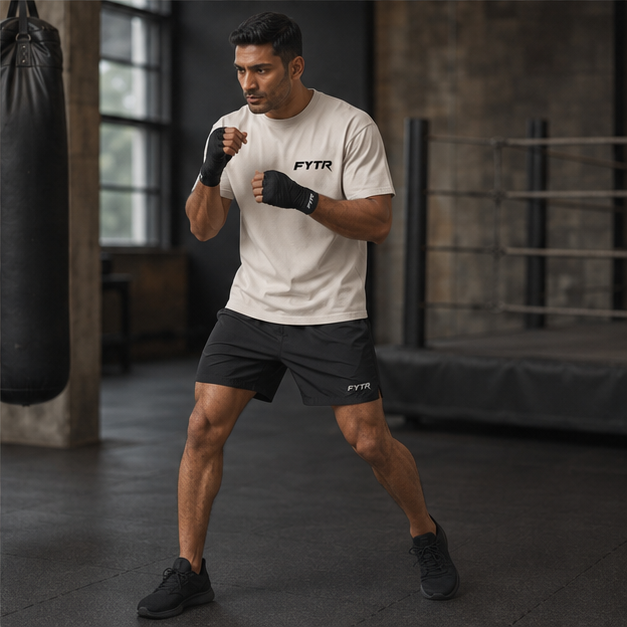 Model moving in the FYTR Core T-Shirt in Natural