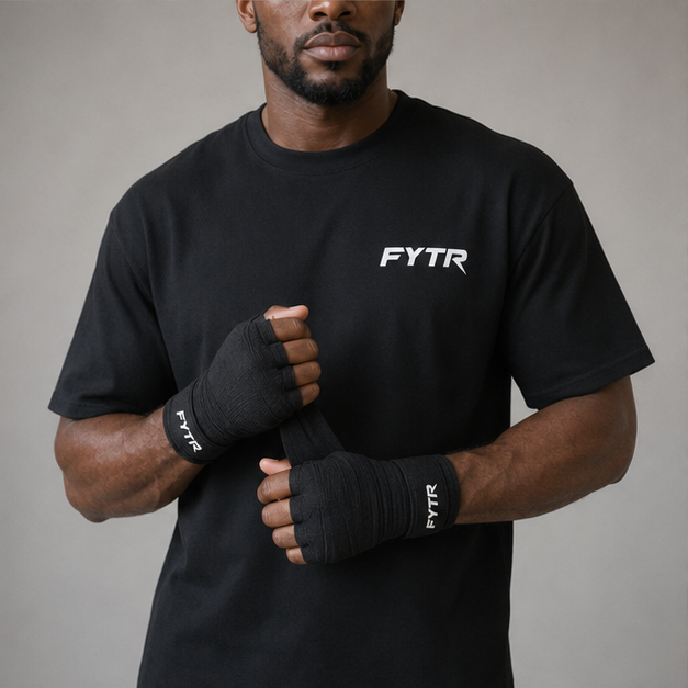 FYTR chest logo and branded hand-wrap detail on the Black Core T-Shirt